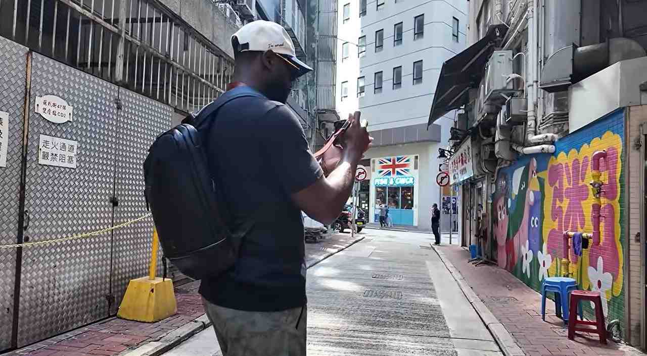 韦德谈喜欢摄影：大家总低头看手机 相机会让你重新抬头看世界